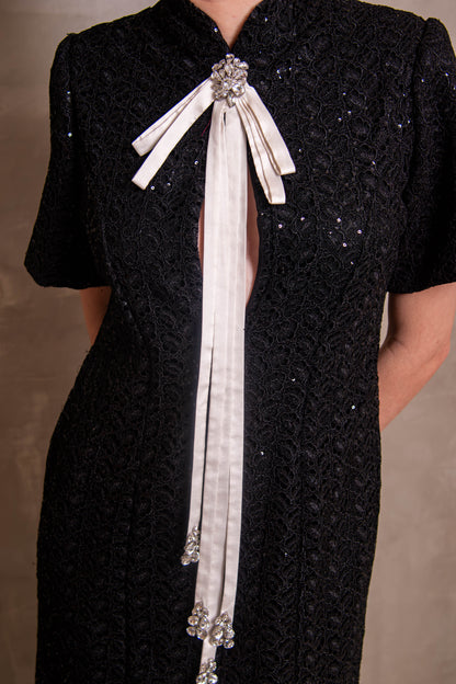 Black Sequin Column Gown with Contrast White Bow Tie