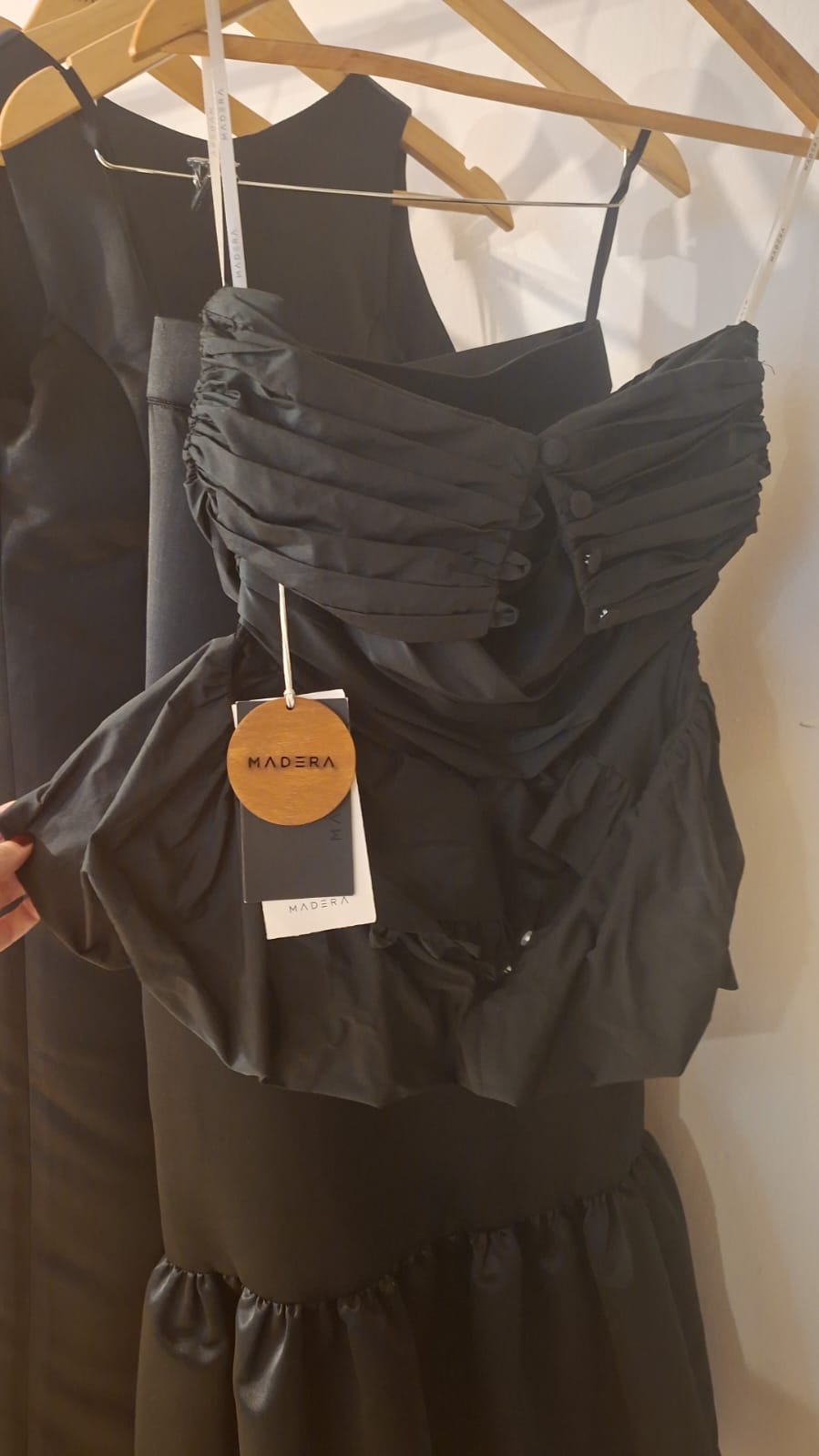 Black Strapless Ruched Top with Voluminous Peplum Hem